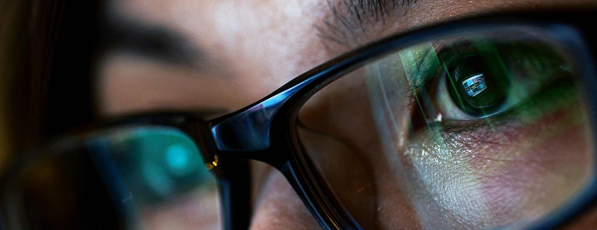 reflection in woman's glasses