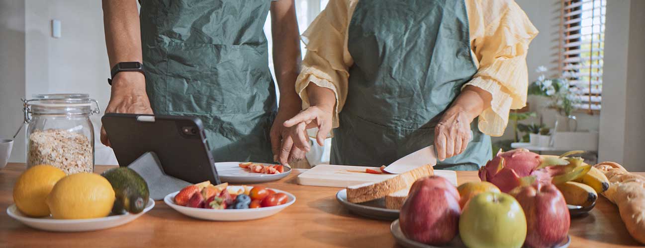 Couple preparing healthy meal together