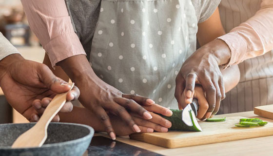 Family cooking breakfast together