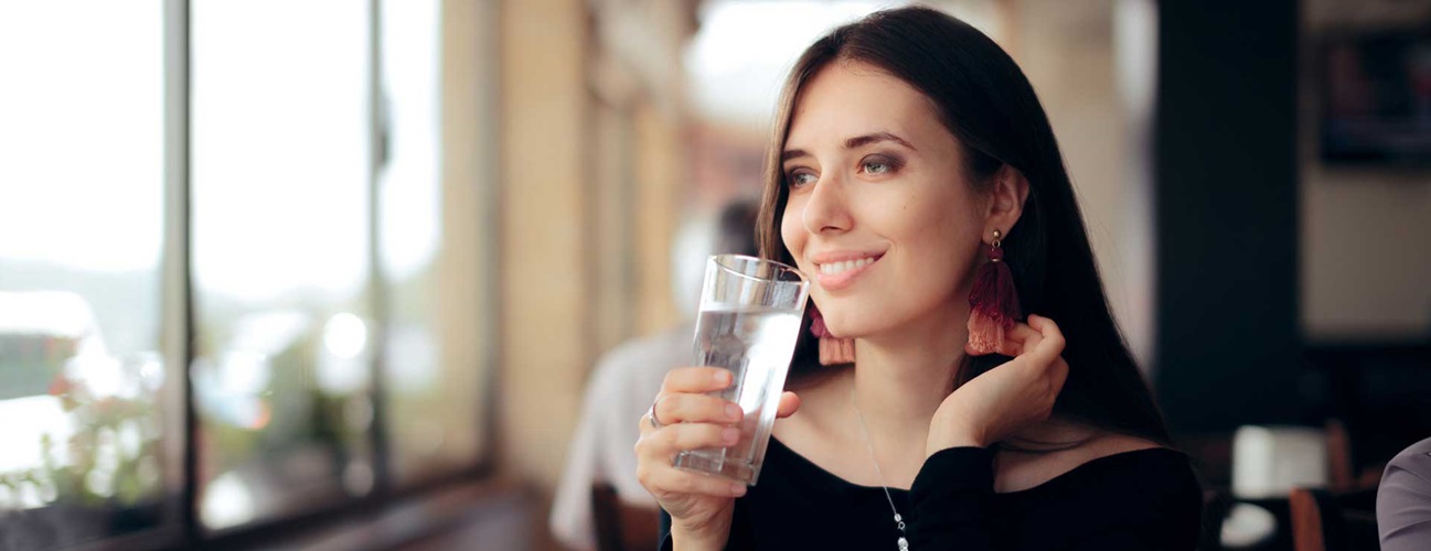 Women drinking water during fasting