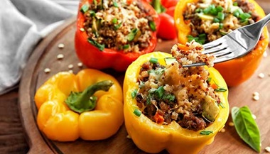 A tray of stuffed peppers.