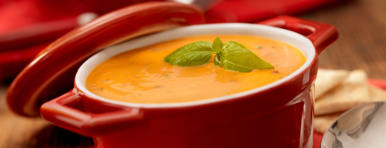 a pot full of tomato basil soup