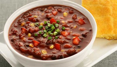 Bowl of chili with cornbread