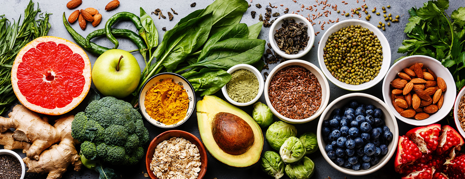 spread of healthy fruits, vegetables and nuts
