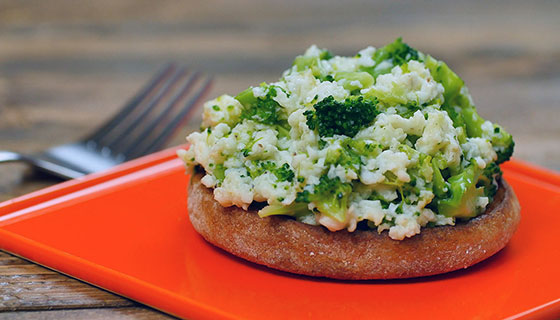 broccoli cheese egg scramble on an English muffin