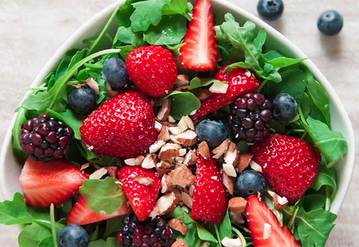Salad with strawberries, blueberries and blackberries