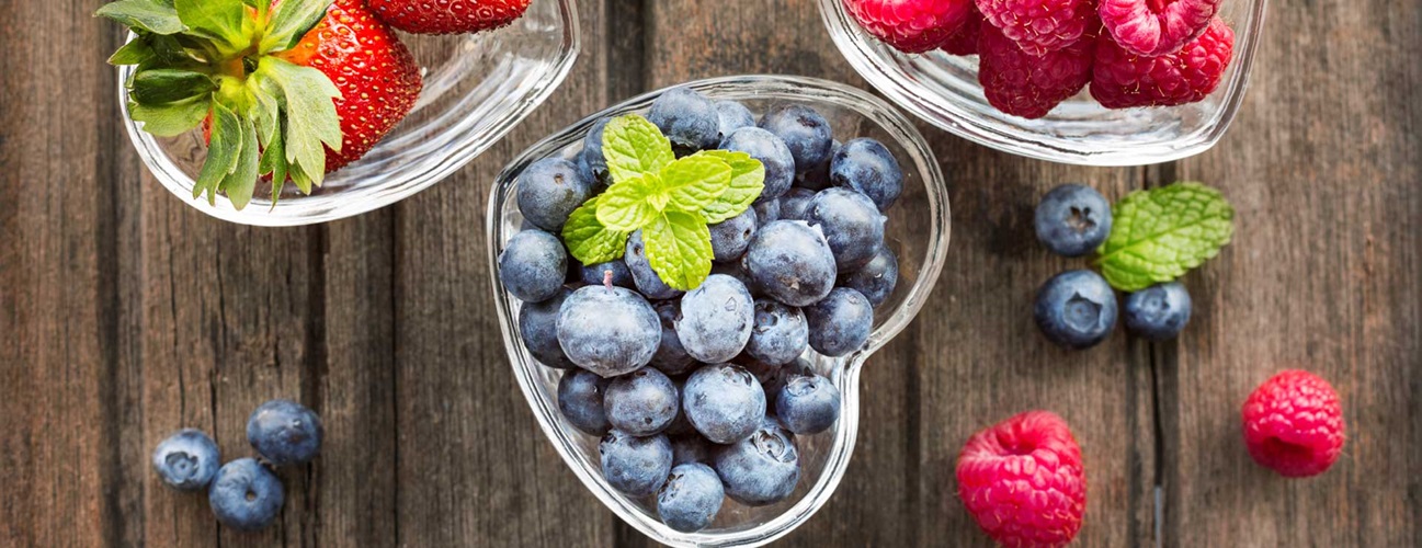 blueberries in a heart-shaped dish