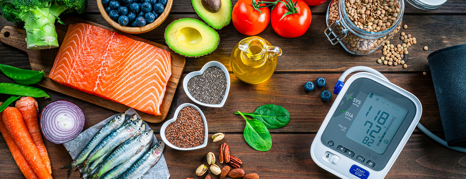 heart monitor surrounded by healthy foods