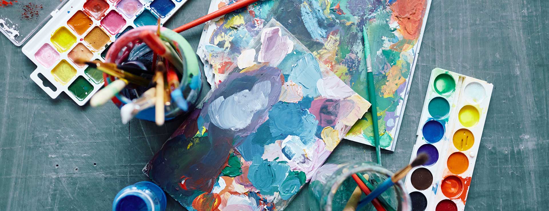 Paint supplies on a table.