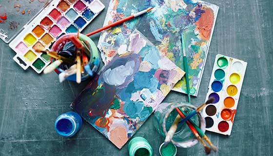 Paint supplies on a table.