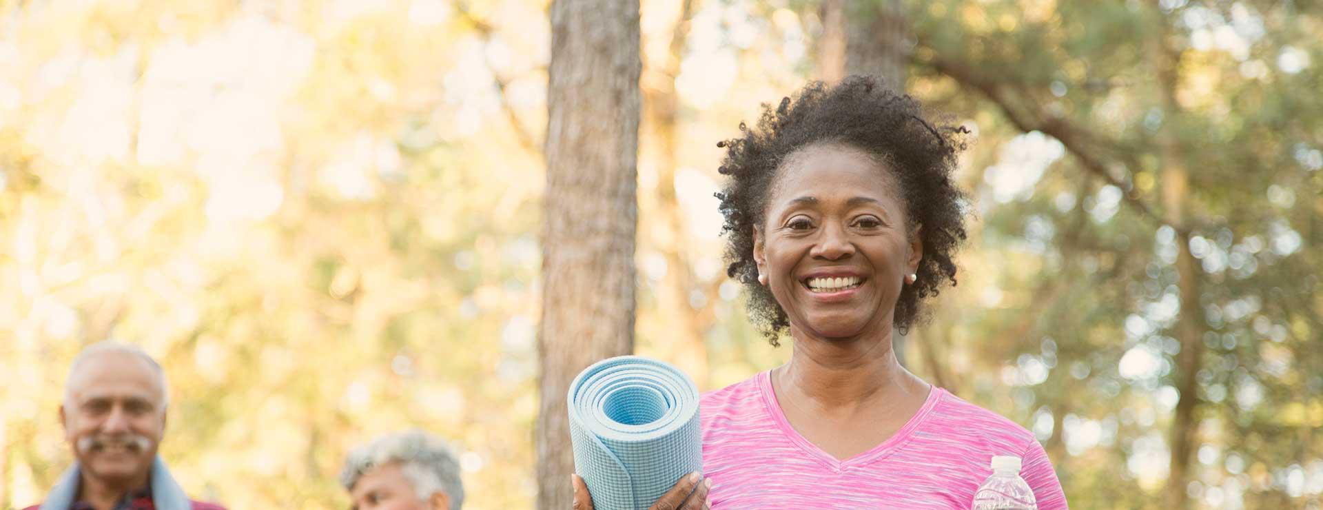 woman with yoga mat
