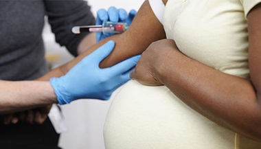 pregnant person gets blood drawn