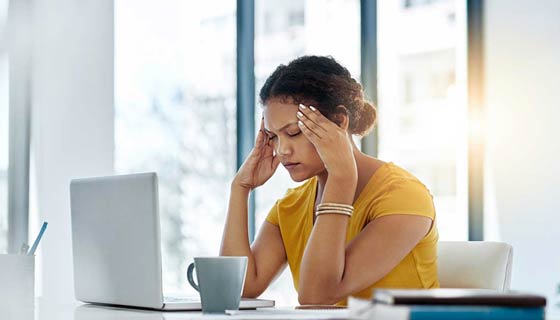 Woman stressed at computer