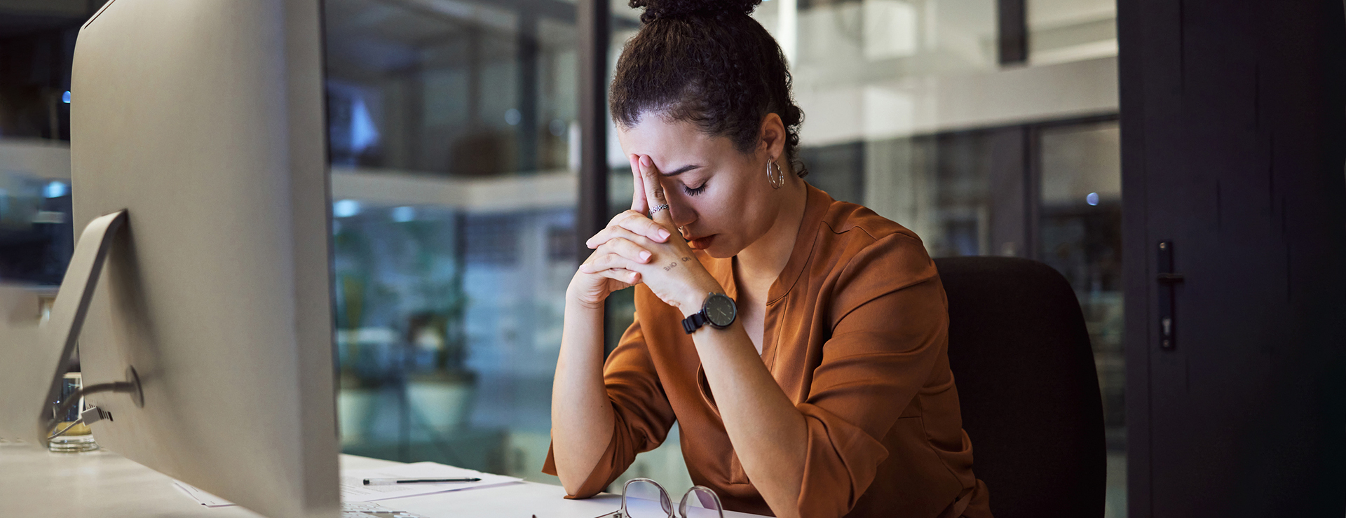 Woman sitting at her work desk. 