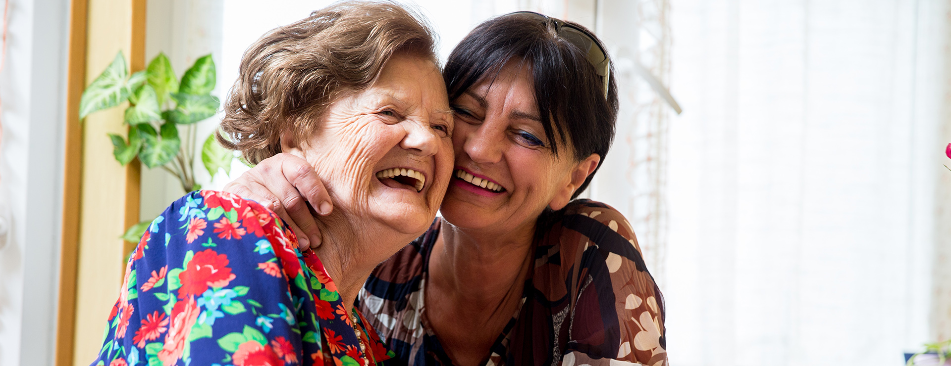 woman hugging her mother