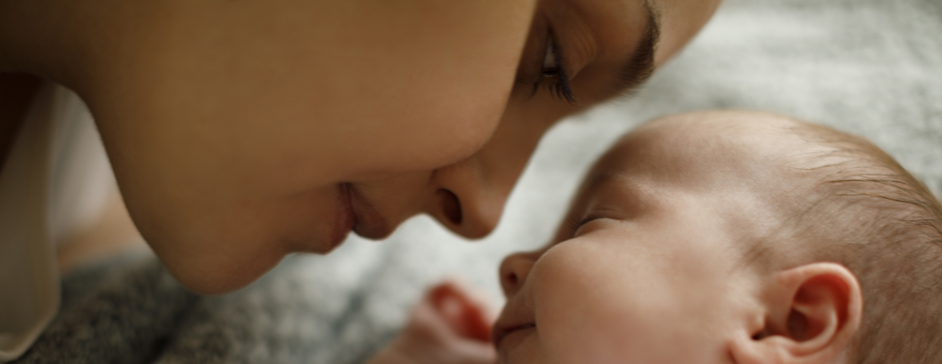 mother looking at baby