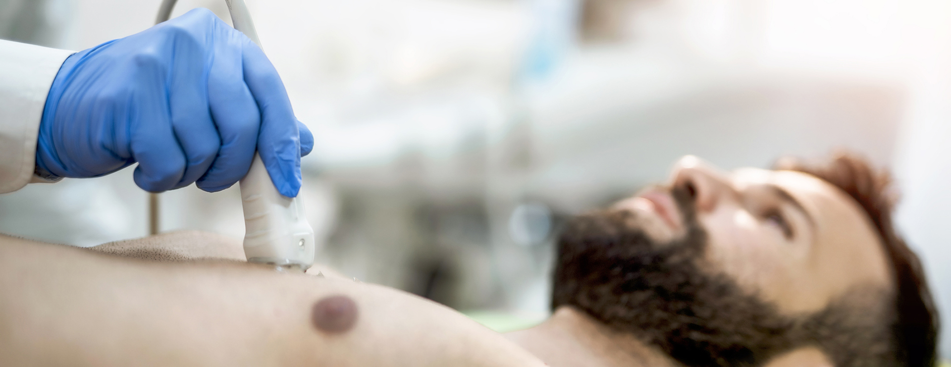 man undergoing chest ultrasound