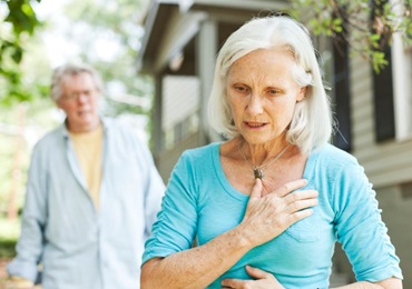 Older woman with heartburn