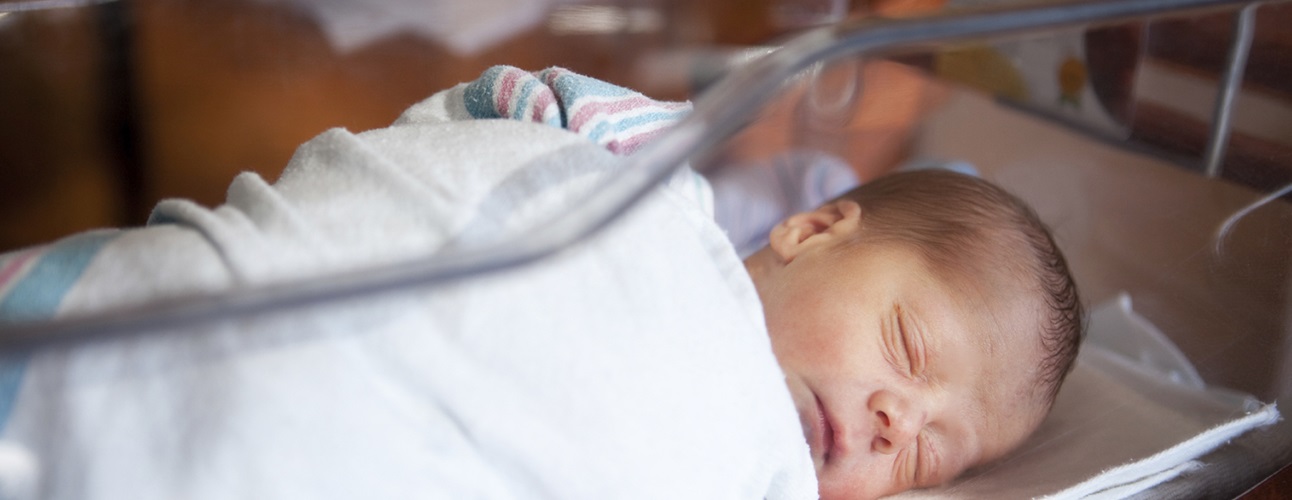 newborn baby in hospital room
