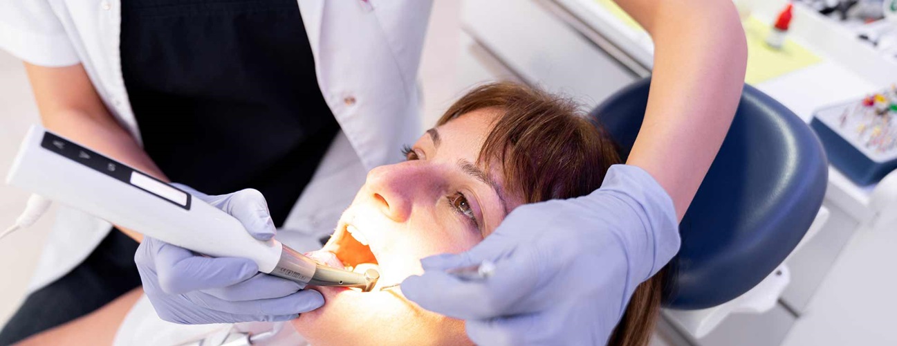 Women receiving a dental treatment. 