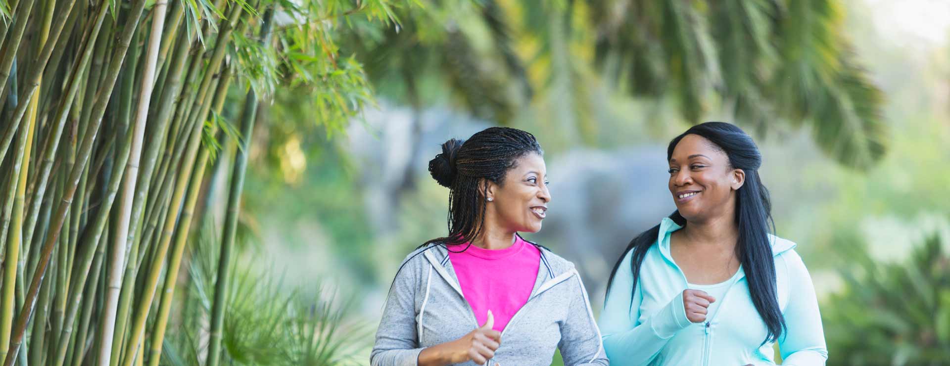 Women being active in the park. 