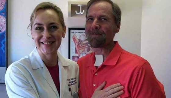 Dr. Gourin with head and neck cancer patient Steve.