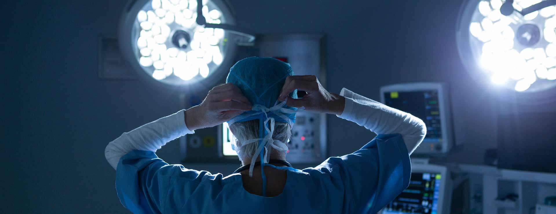Surgeon preparing for surgery. 
