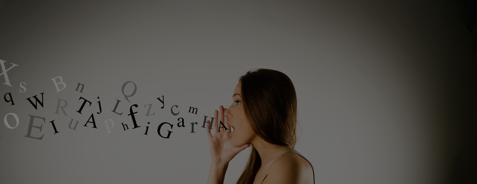 girlspeakingwhileletterscomeoutofhermouth