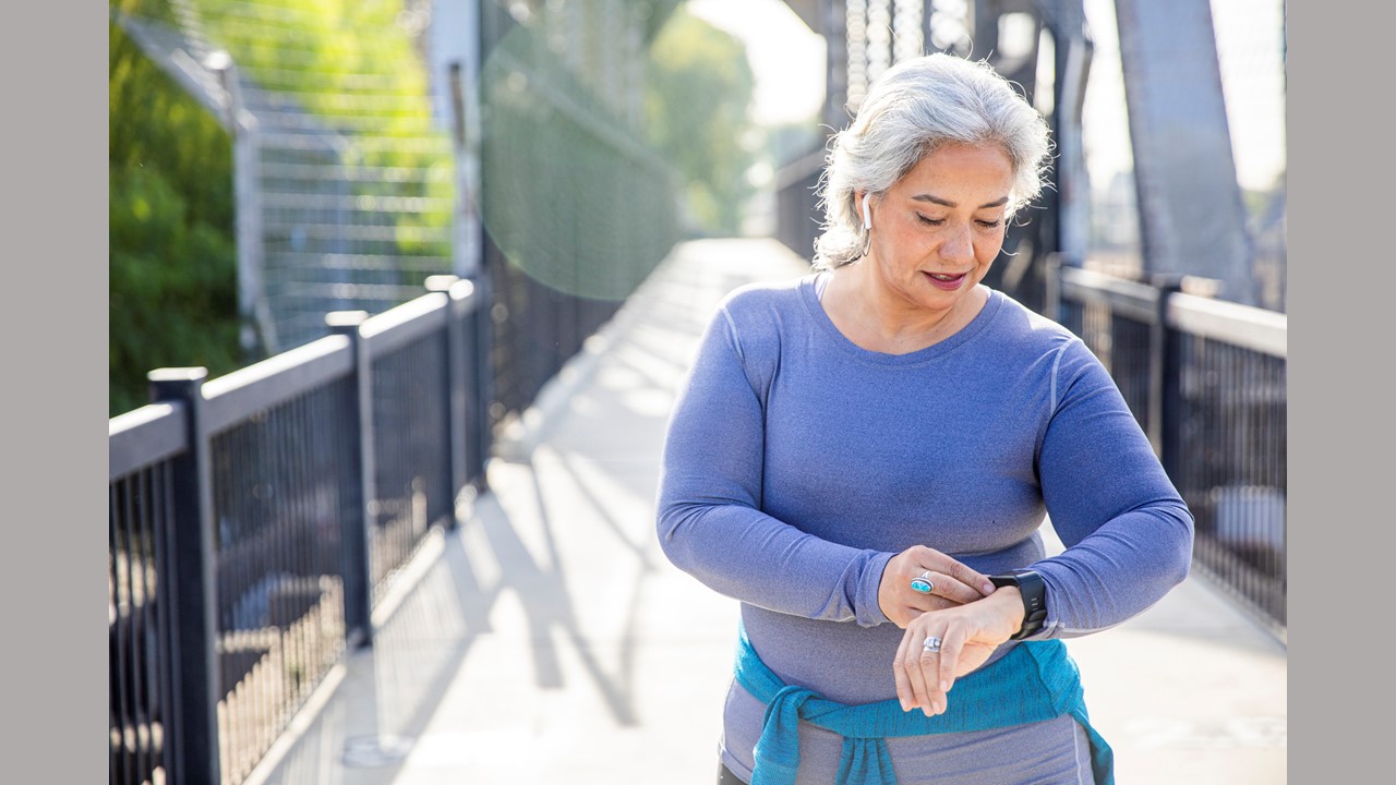 Woman wearing a fitness tracker.
