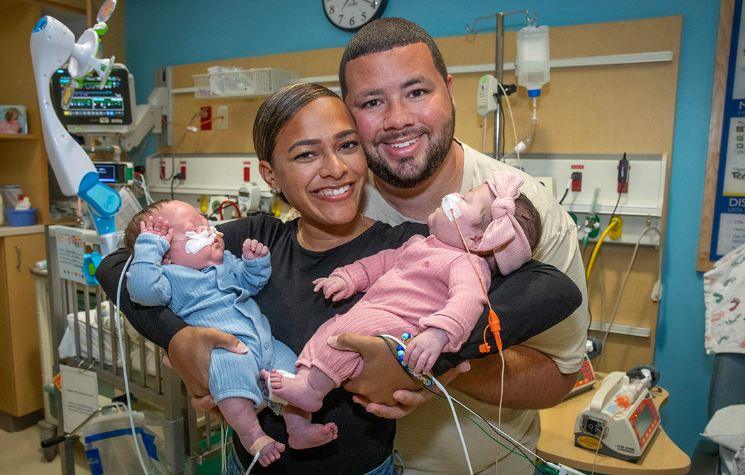Charlotte and Jett with their parents Chelsea and Joshua in the neonatal intensive care unit at Johns Hopkins All Children's Hospital