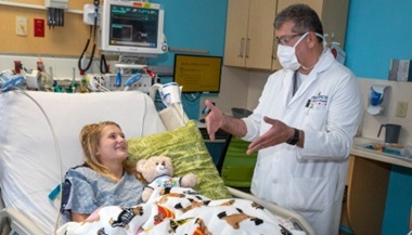 Ashley with Dr. George Jallo at Johns Hopkins All Children's