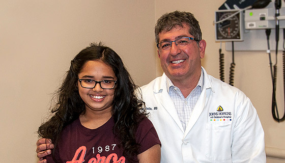 Christina with George Jallo, M.D. at Johns Hopkins All Children's Hospital. 