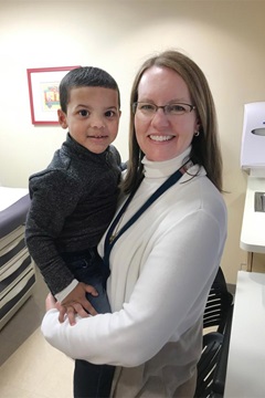 3-year-old Dariel with pediatric surgeon Nicole Chandler, M.D.