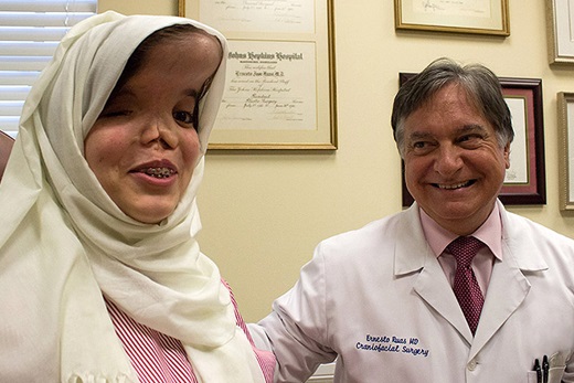Fatima with Ernesto Ruas, M.D., a plastic surgeon at Johns Hopkins All Children’s Hospital in St. Petersburg, Florida. 