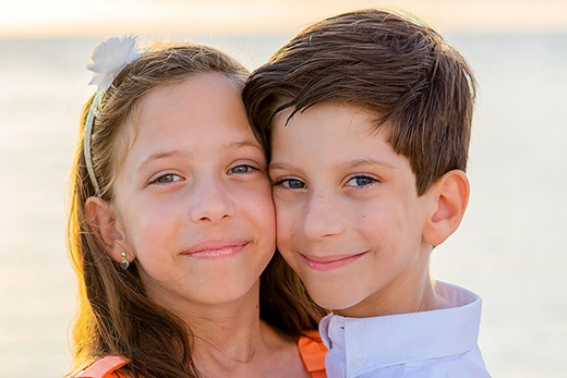 Twins Giuliana and Nicholas spent four months in the NICU after a necessary premature delivery. Today, they are 7 years old and thriving as happy, healthy second graders. Photos by aleisasigmonphotography.com.