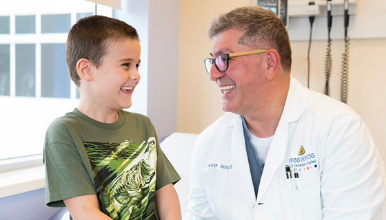 Henry with Dr. George Jallo at Johns Hopkins All Children's