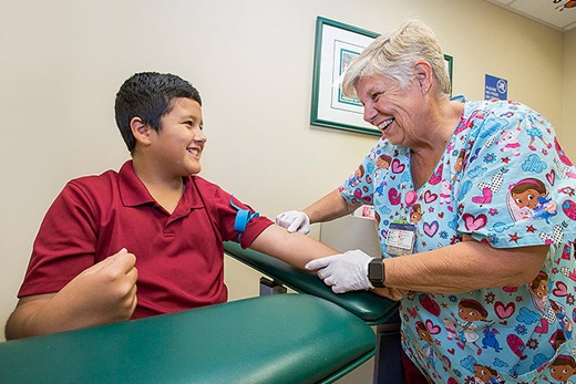 Hunter receiving care at the Vascular Anomalies Clinic. 