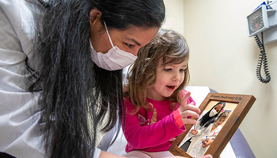 Lyla with Raquel Gonzalez, M.D., at Johns Hopkins All Children's