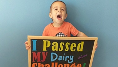 Nico celebrating completing an oral food challenge at Johns Hopkins All Children's