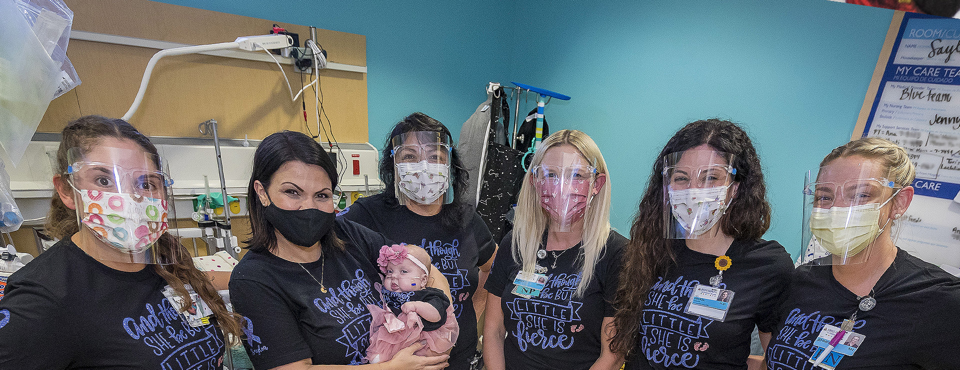 A photo of Saylor and her care team