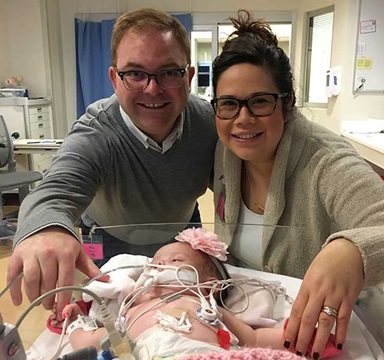 Adrienne and Jim with baby in hospital