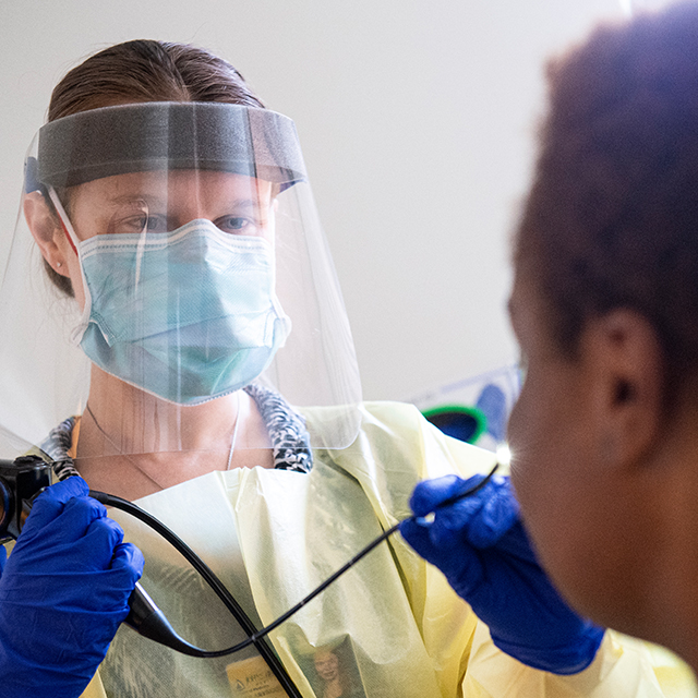 A photo shows a procedure during 2020 in the Johns Hopkins Department of Otolaryngology-Head and Neck Surgery. 