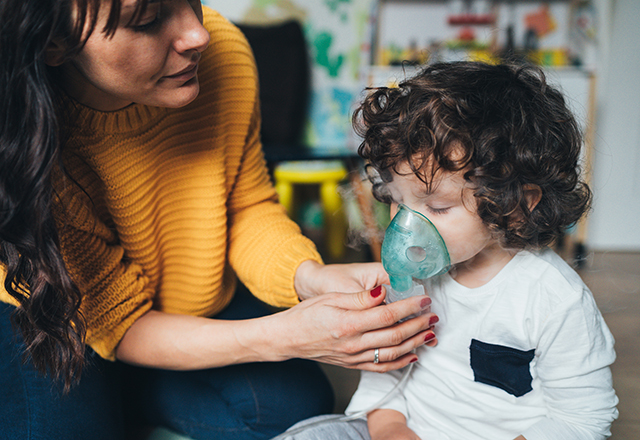Mother helps child breath easier