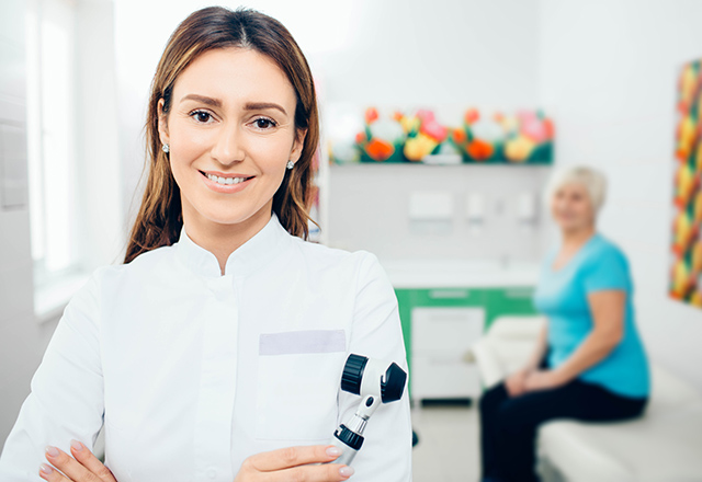 Nurse and patient prepare for examination