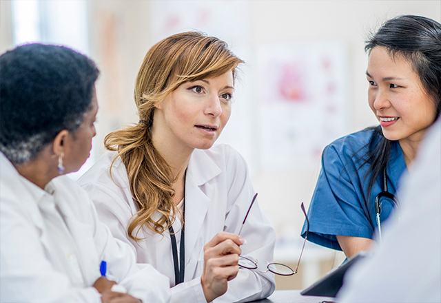 Nurse and doctors discuss results