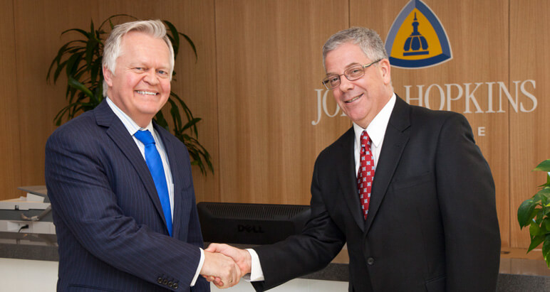 Shaking Hands after signing agreement