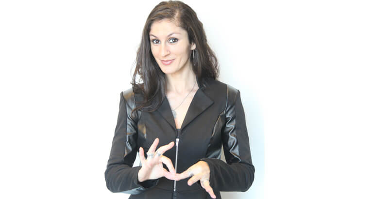 Woman signing a word with Sign Language.