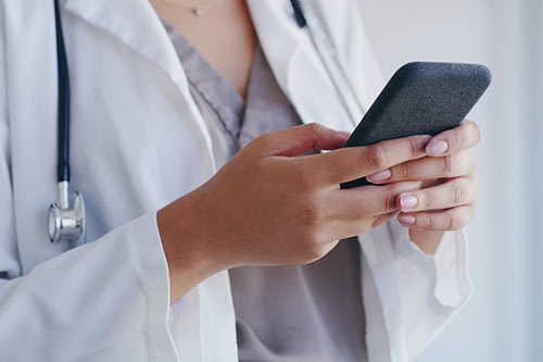 Doctor using cellphone
