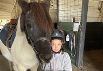 Lily with a horse