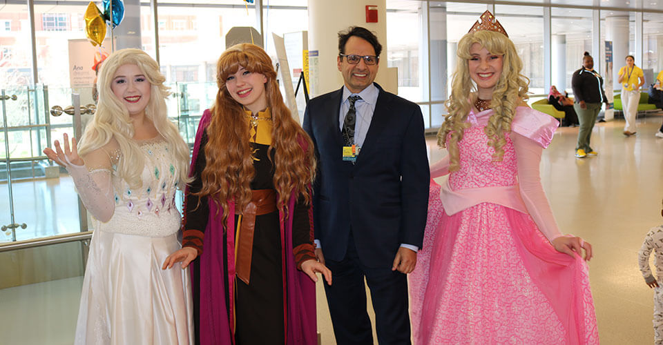 dr hackam with anna, elsa, and aurora
